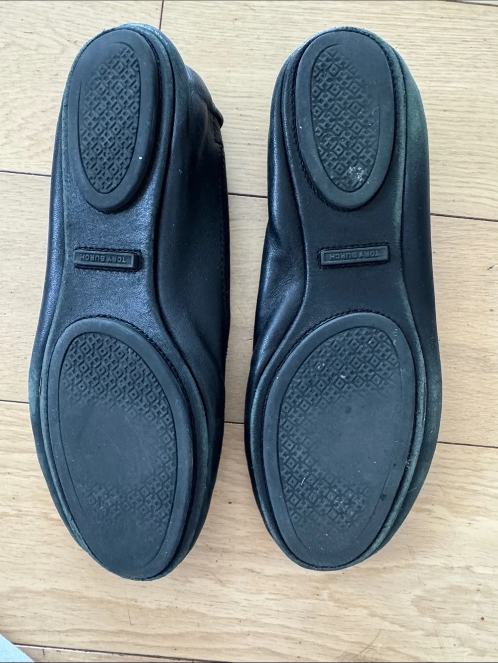 Tory Burch Black Ballet Flats with Gold Logo Medallions